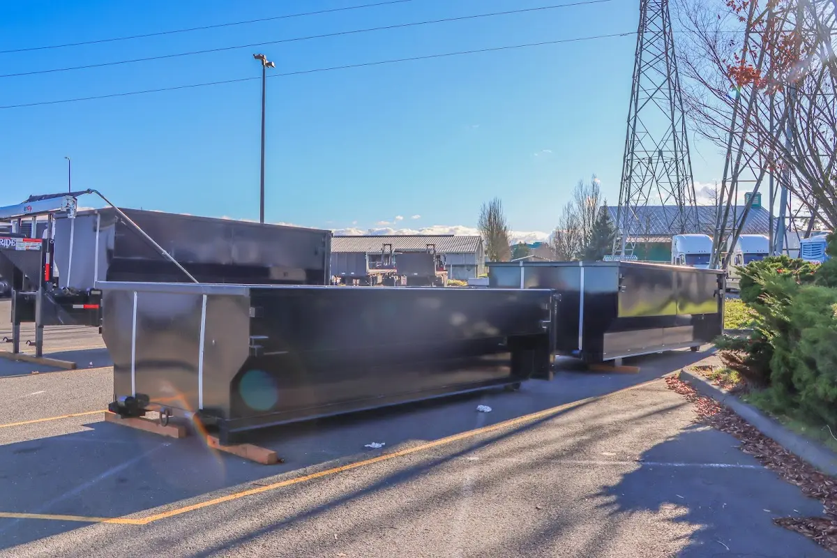 Roll-off dumpster ready for waste disposal at job site for 3 Yard Dumpster Rental in Wyoming